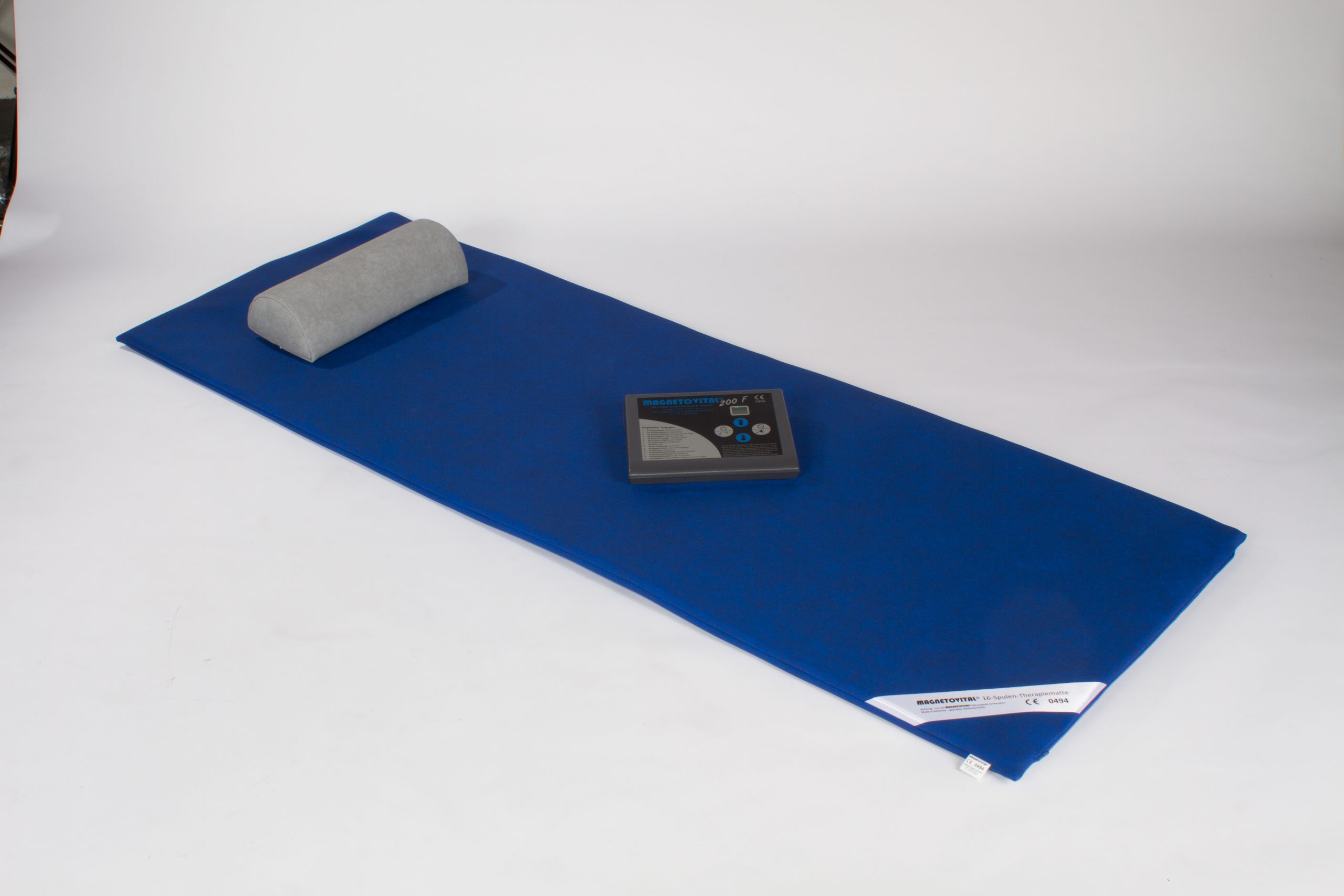 blaue Magnetfeldmatte mit Nackenkissen und Steuergerät